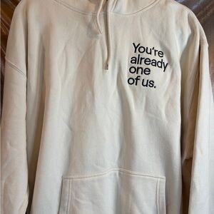 New Twitch Cream Hoodie with Black Text “you’re already one‎ of us” 500